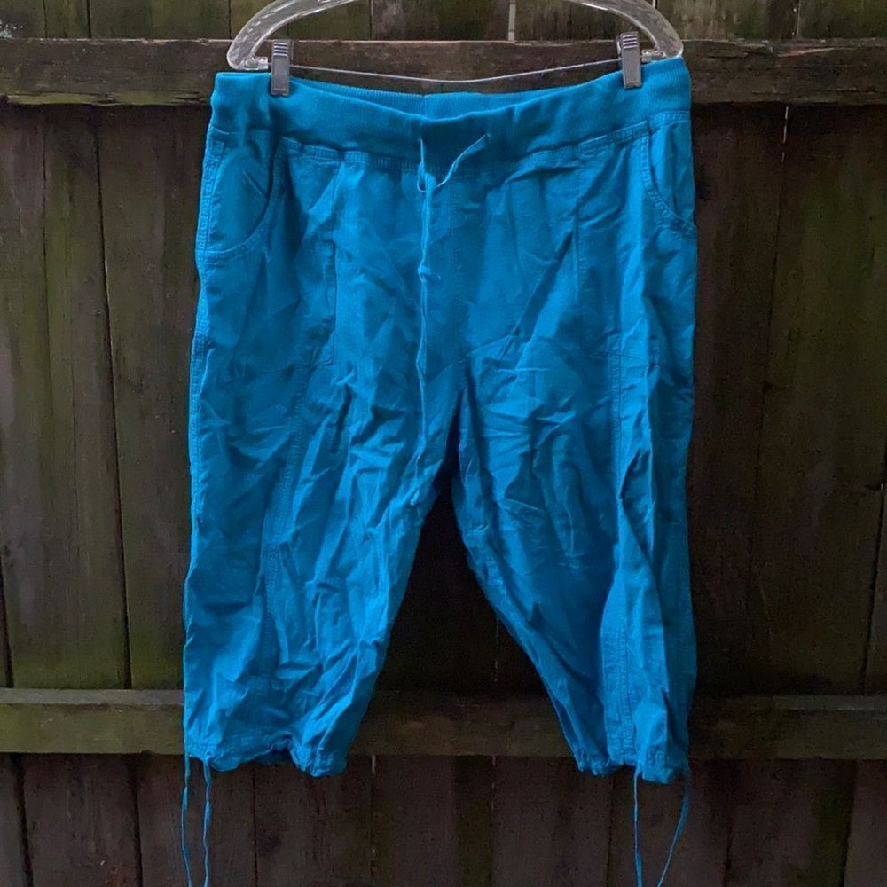 Erika teal captain. XL petite